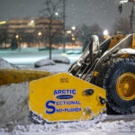arctic snow and ice HD-pusher-on-wheel-loader