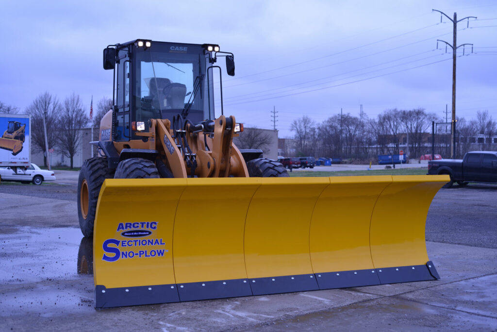 arctic snow and ice sectional snow plow on wheel loader