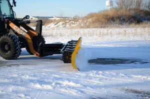 arctic snow and ice sectional snow plow plowing snow side2