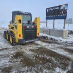 Gehl 4640 skid steer loader parked near a Plains Equipment Rentals sign, showcasing its rear exhaust, taillights, and branding. Available for purchase in Western Canada