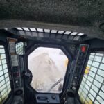 Interior shot from inside the Gehl 4640 skid steer loader Comfortable and well-maintained unit for sale in Western Canada.jpg
