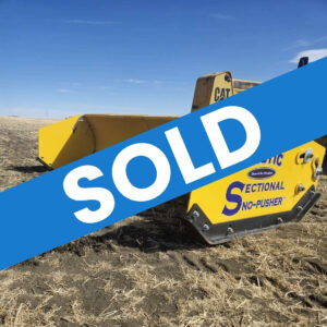 arctic-sectional-sno-pusher-10-5hd-side-view-mounted-on-loader-industrial-snow-pusher-western-canada