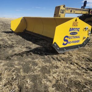 arctic-sectional-sno-pusher-10-5hd-side-view-mounted-on-loader-industrial-snow-pusher-western-canada