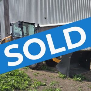 case-321f-wheel-loader-side-profile-near-building-western-canada-construction-equipment-sold