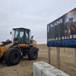 case-521g-wheel-loader-in-front-of-plains-equipment-rentals-sign-heavy-equipment-sales-and-rentals-alberta-canada