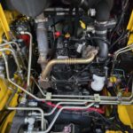 engine compartment of a Gehl 4640 skid steer loader Ideal for buyers looking for a well-maintained skid steer in Western Canada