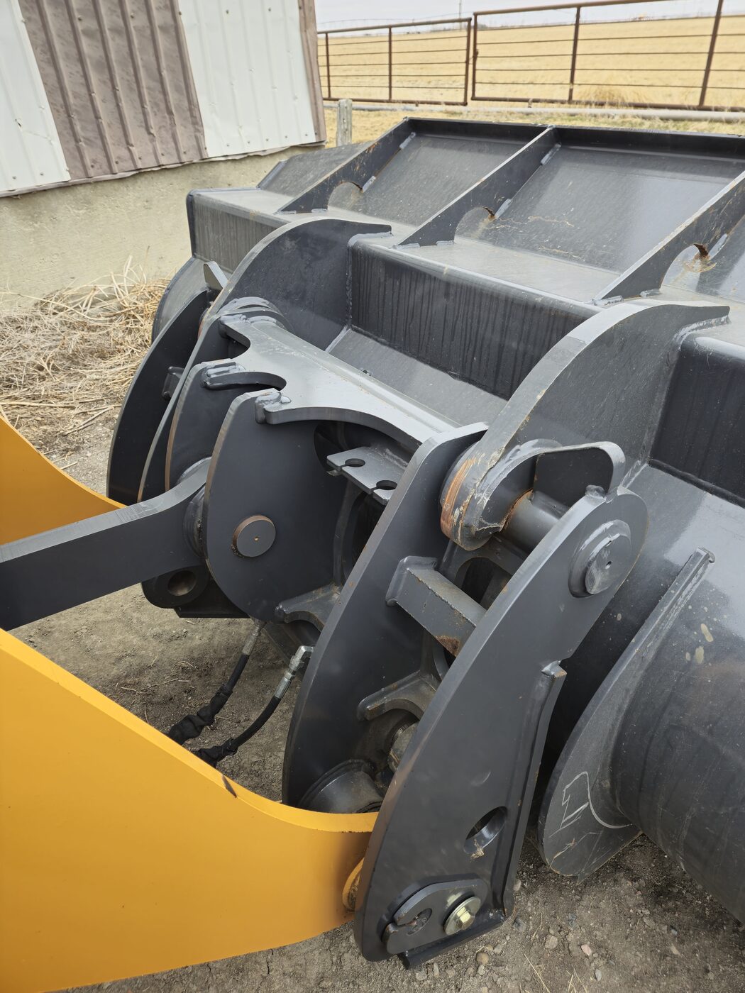 quick-attach-system-and-loader-arms-case-521g-heavy-equipment-close-up-western-canada
