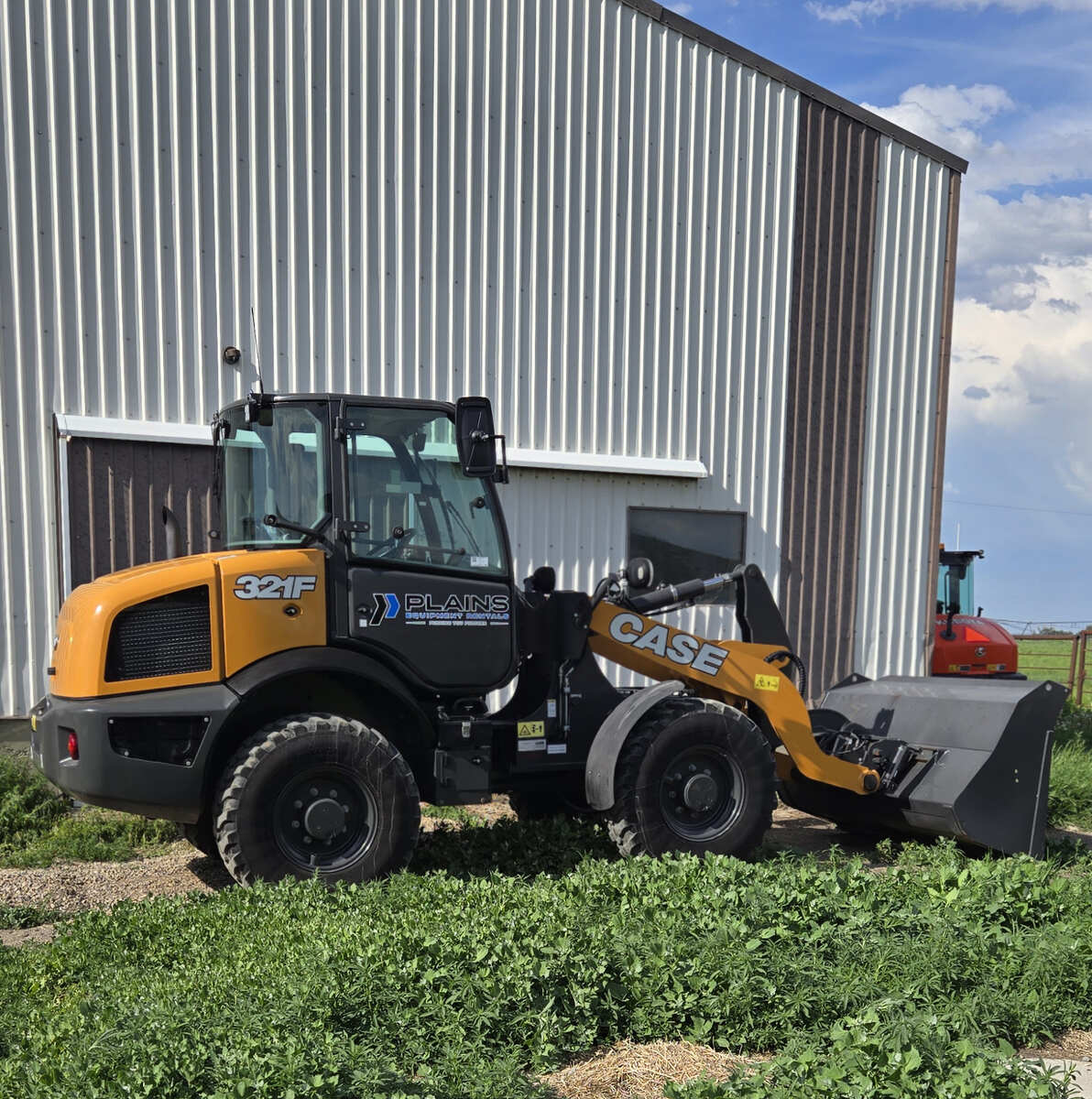 case-321f-loader-side-angle-with-loader-arm-and-heavy-duty-tires-western-canada