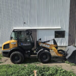 case-321f-wheel-loader-left-side-profile-with-bucket-western-canada