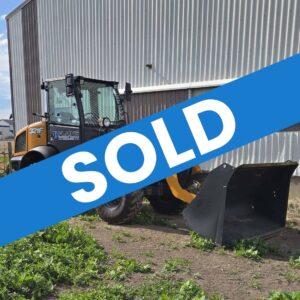 case-321f-wheel-loader-side-profile-near-building-western-canada-construction-equipment