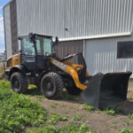 case-321f-wheel-loader-side-profile-near-building-western-canada-construction-equipment