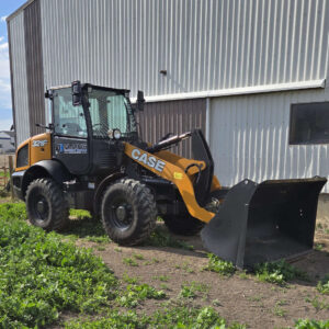 case-321f-wheel-loader-side-profile-near-building-western-canada-construction-equipment
