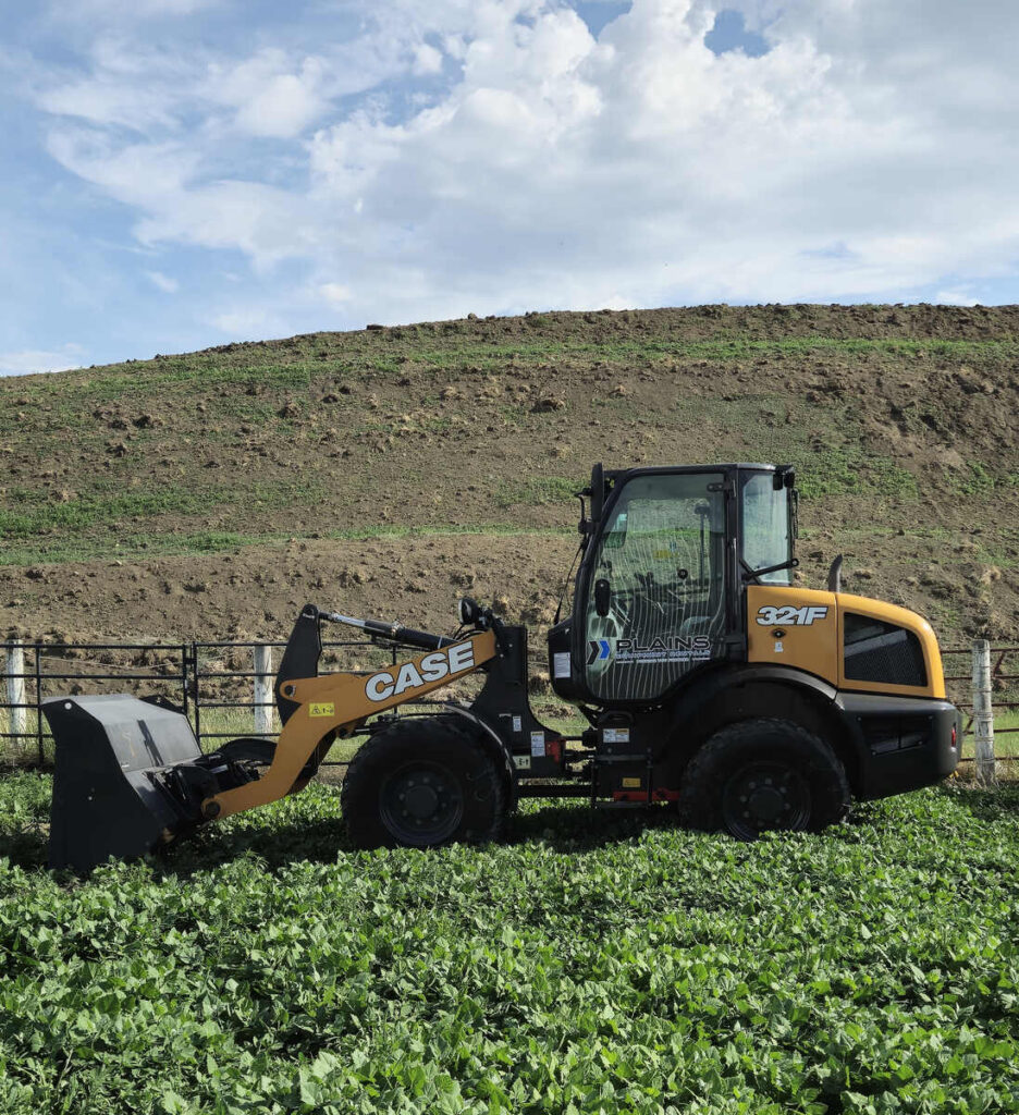 case-321f-wheel-loader-side-view-in-field-western-canada-for-sale