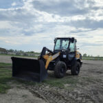 case-321f-wheel-loader-with-bucket-attachment-on-jobsite-western-canada-plains-equipment-rentals