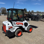 side-view-2022-bobcat-l28-loader-on-gravel-yard-for-sale-in-western-canada