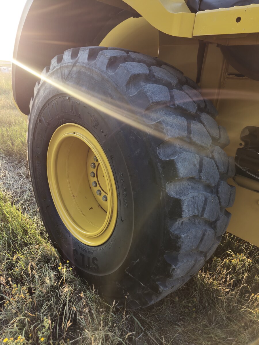 Heavy-duty Titan tire on John Deere 524K-II wheel loader for sale in Canada