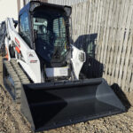 2023-bobcat-t595-track-skid-steer-front-view-for-sale-western-canada