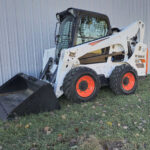 bobcat-s770-skid-steer-angled-side-view-with-bucket-attached-western-canada