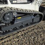 close-up-2023-bobcat-t595-skid-steer-undercarriage-and-tracks