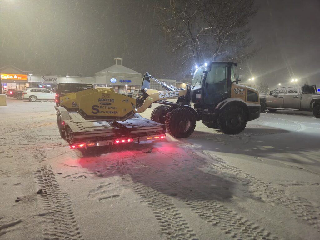 case-321f-wheel-loader-with-arctic-sectional-snow-pusher-western-canada-snow-removal-equipment