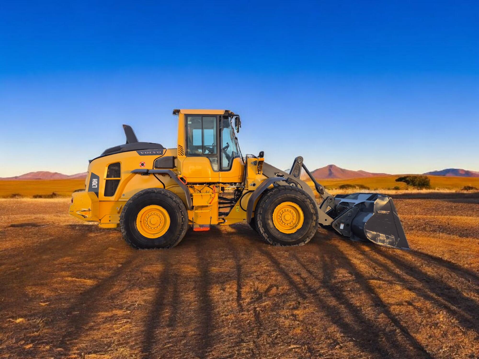 volvo-l70h-wheel-loader-rental-western-canada-side-view-on-jobsite