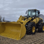 Rear side view of 2010 Komatsu WA250-6 wheel loader in Alberta