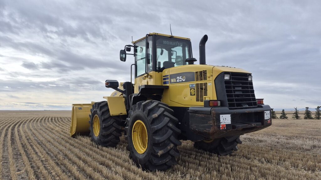 Rear view of 2010 Komatsu WA250-6 showing counterweight and tires