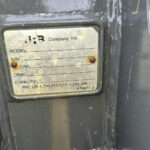 Manufacturer plate on Komatsu WA250-6 bucket attachment