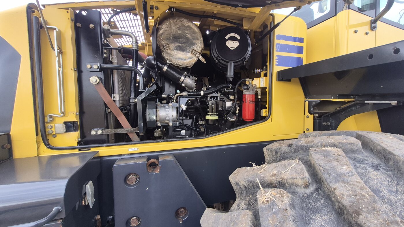 Right side engine compartment of 2010 Komatsu WA250-6 showing components
