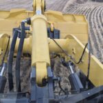 Loader arm hydraulics on 2010 Komatsu WA250-6 viewed from cab