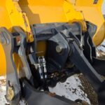 John Deere 444 P-tier snow plow bucket attachment for winter equipment rental services