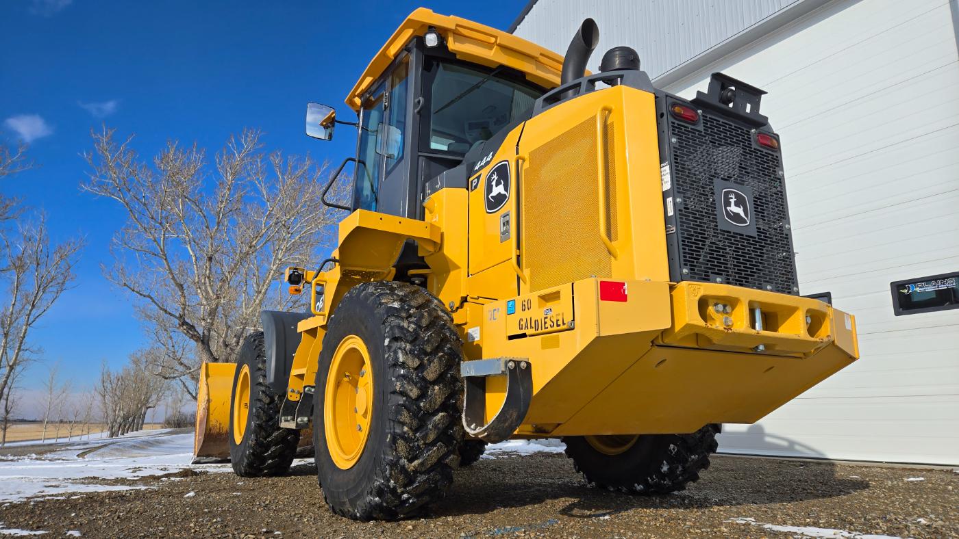 Yellow John Deere 444 wheel loader equipment rental machinery for western Canada operations