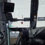 Interior cabin view of John Deere heavy equipment used by Plains Equipment Rentals in Western Canada