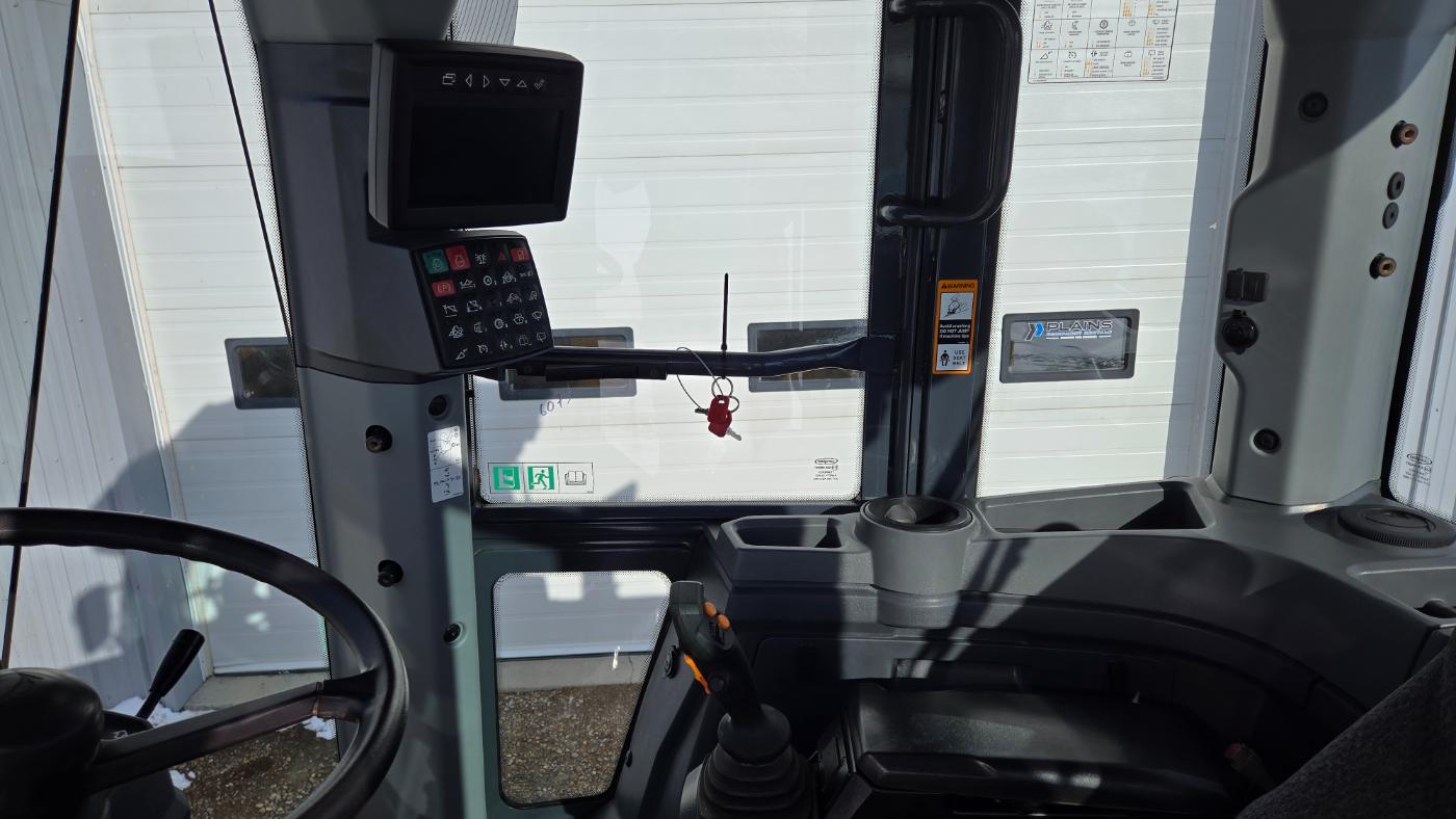 Interior cabin view of John Deere heavy equipment used by Plains Equipment Rentals in Western Canada