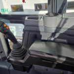 John Deere 444 heavy equipment operator cabin control panel and joystick