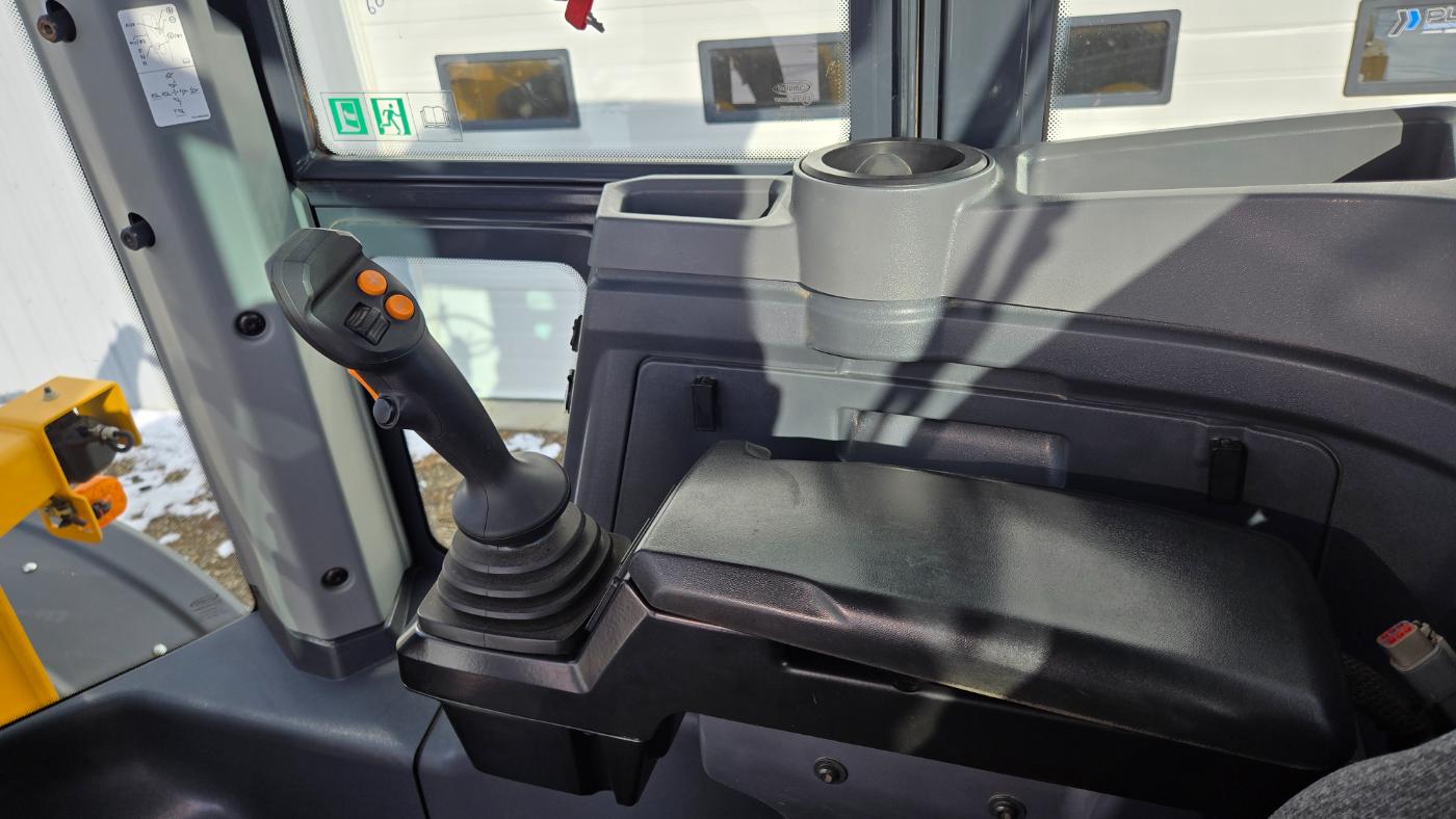 John Deere 444 heavy equipment operator cabin control panel and joystick