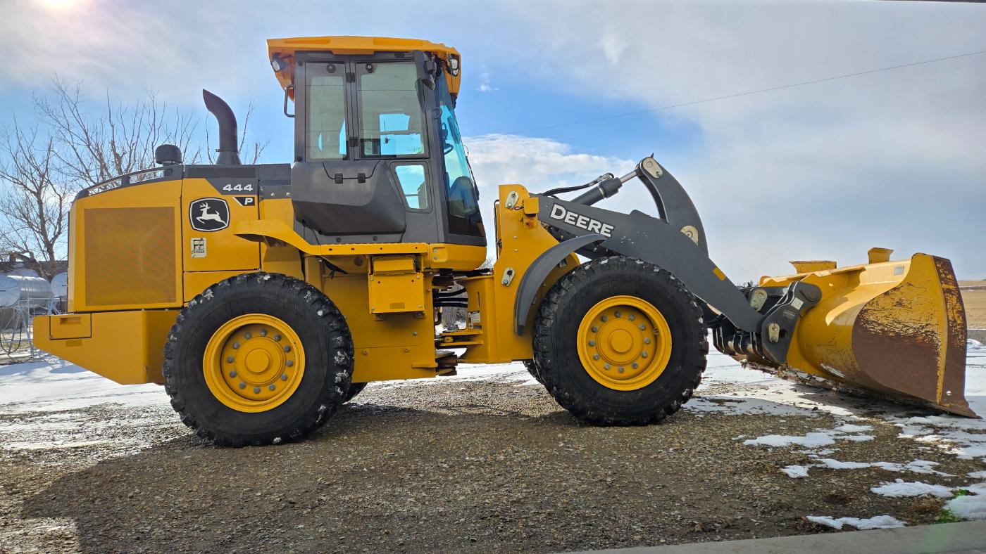 John Deere 444 P-Tier snow plow equipment for western Canada plains rental services