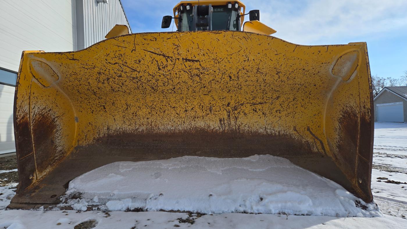 John Deere 444 wheel loader with snow bucket from Plains Equipment Rentals