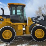 John Deere 444 P-Tier snow plow equipment for western Canada plains rental services