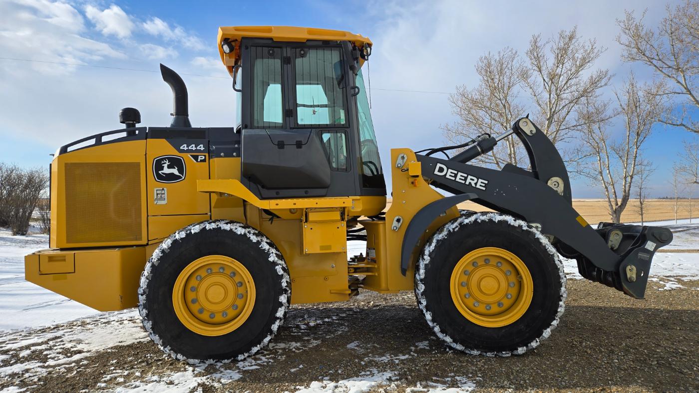 John Deere 444 P-Tier snow plow equipment for western Canada plains rental services