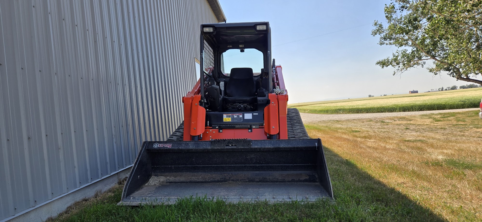 2021 Kubota SVL97-2 track skid steer for sale in Western Canada, front view bucket