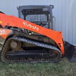 2021 Kubota SVL97-2 track skid steer for sale in Western Canada, side view loader arms
