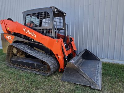 2021 Kubota SVL97-2 track skid steer for sale in Western Canada, front three quarter with bucket